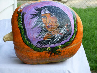painted native american women n a pumpkin
