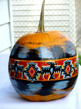 Tribal 360 degree paintd around a pumpkin
